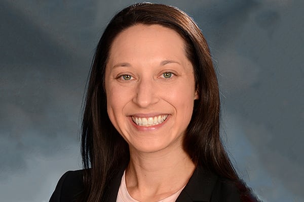woman physical therapist smiling