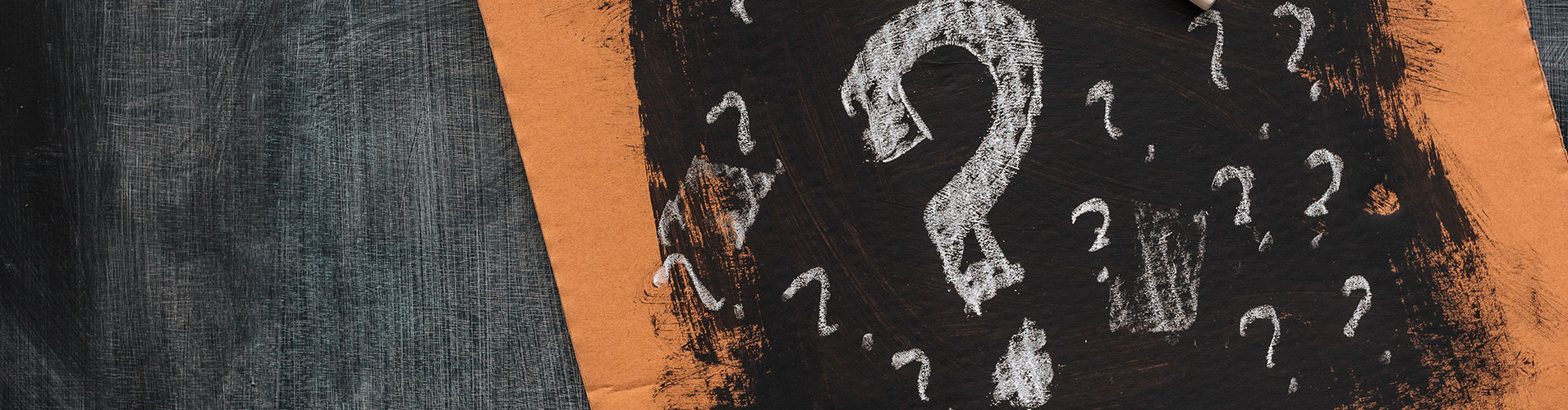 Question marks drawn cardboard