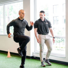Dr. Cody Brown teaching a patient